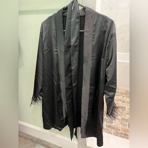 Satin robe with feathers